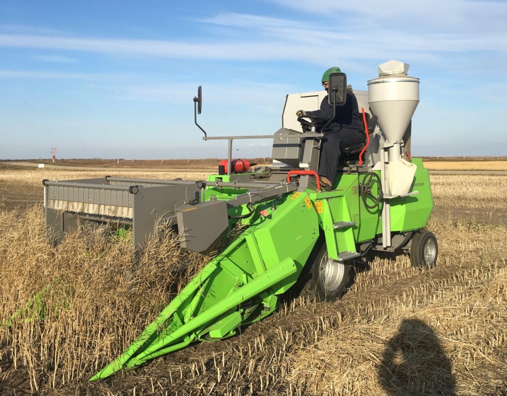 Typical small custom combine used to harvest crop research plots